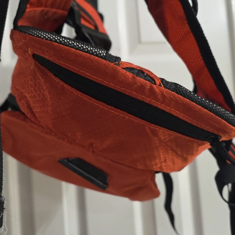 NWOT TOPI Orange Black Hydration Backpack Cooler Hiking Outdoor Travel​​